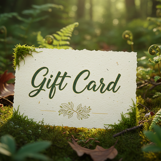 Gift card with green text on a background of a forest with sunlight filtering through the trees.
